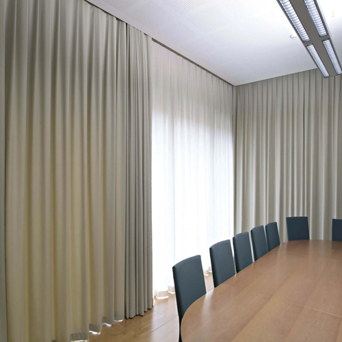 blackout curtains enhancing the bedroom's aesthetic and comfort