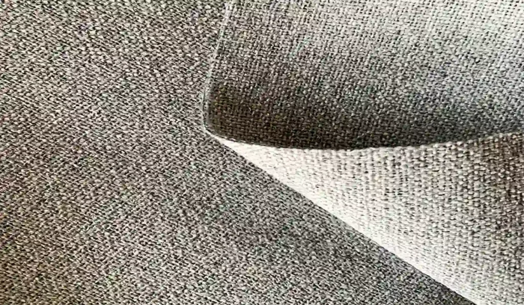 Foam backed blackout curtain fabric for thermal insulation