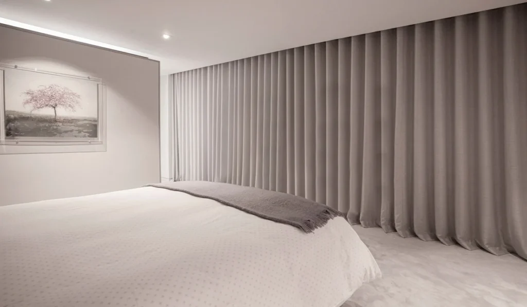 Bedroom curtains installed in commercial property bedroom