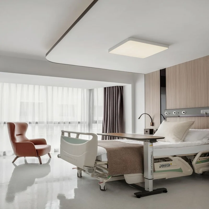 Light-filtering curtains in nursing home resident bedroom