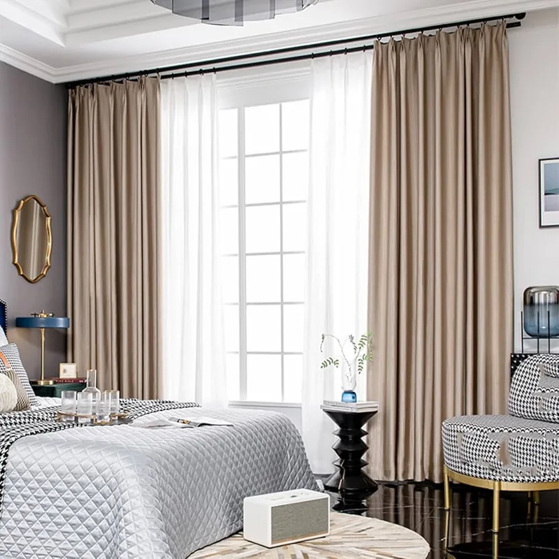 Luxury curtains in elegant master bedroom interior